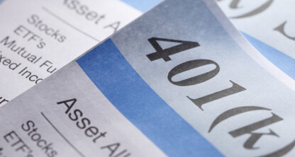 Close-up of financial documents, including a prominently displayed 401(k) retirement account statement, with lists of investment options—essential resources often reviewed by Chicago lawyers at reputable law offices.