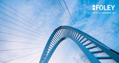 Upward view of a modern arched cable-stayed bridge against a cloudy sky, with "FOLEY FOLEY & LARDNER LLP" logo in the upper right corner, highlighting one of the leading corporate law offices and lawyers in Chicago.
