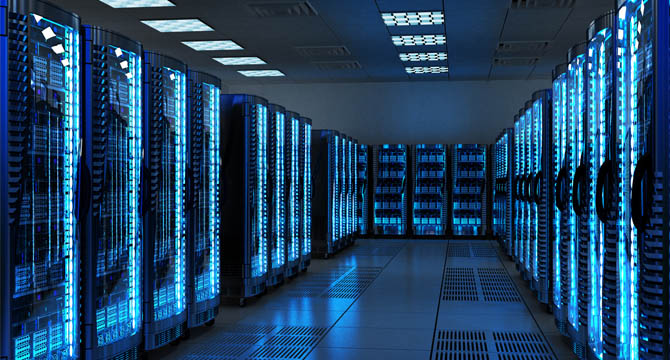 A data center room with rows of server racks illuminated by blue lights, reflecting the high-tech, organized environment relied on by leading corporate law offices and Chicago lawyers for secure data storage and processing.
