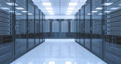 A modern data center with rows of server racks in a clean, brightly lit room, offering advanced litigation support for lawyers in Chicago; reflective floors and a white ceiling enhance the professional environment.