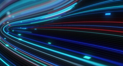 Curved lines of colorful neon light streaks, including blue, red, and turquoise, flow across a dark background, evoking the dynamic energy often found in leading Chicago lawyers' modern law offices.
