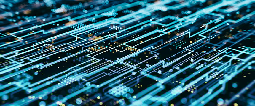 Close-up view of a digital circuit board with glowing blue lines and components, symbolizing data pathways and electronic connections—ideal for illustrating technology in intellectual property law.