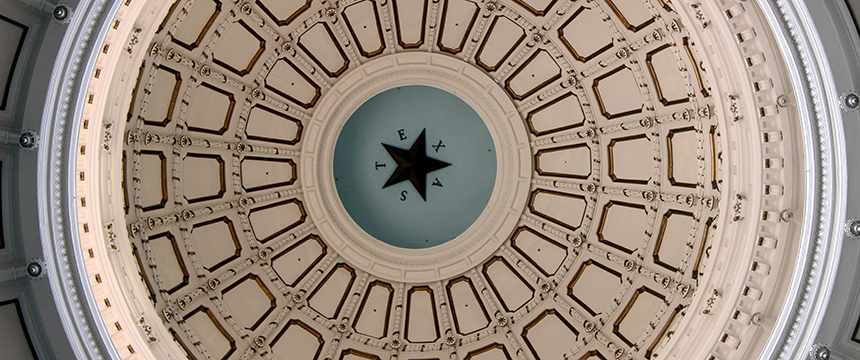 View of the interior dome ceiling of the Texas State Capitol, featuring a central star with "TEXAS" around it—a stunning landmark often admired by those in litigation support and corporate law offices alike.