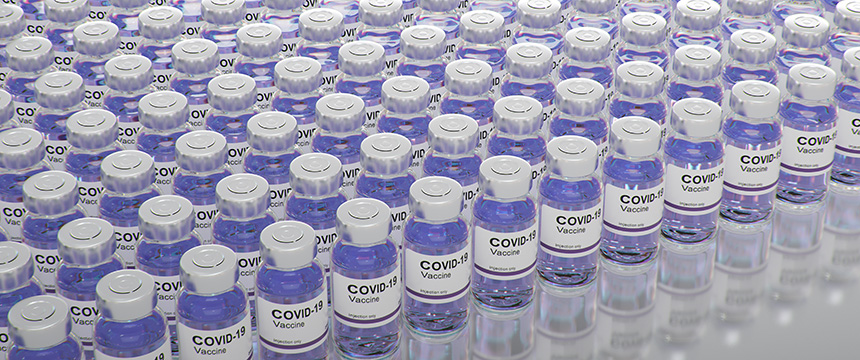 Rows of clear vials labeled "COVID-19 Vaccine" with purple liquid are arranged in a grid pattern on a reflective surface, resembling the precision and organization found in leading intellectual property law offices.