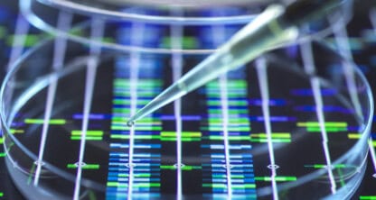 A pipette dispenses liquid into a petri dish placed over a digital DNA sequencing pattern with colored bars, highlighting the intersection of biotech innovation and intellectual property law.
