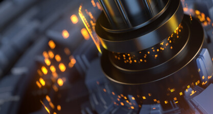 Close-up of a metallic, circular mechanical structure with glowing orange lights on a dark, blurred background, reminiscent of the precision and innovation seen in Chicago lawyers' approach to intellectual property law.