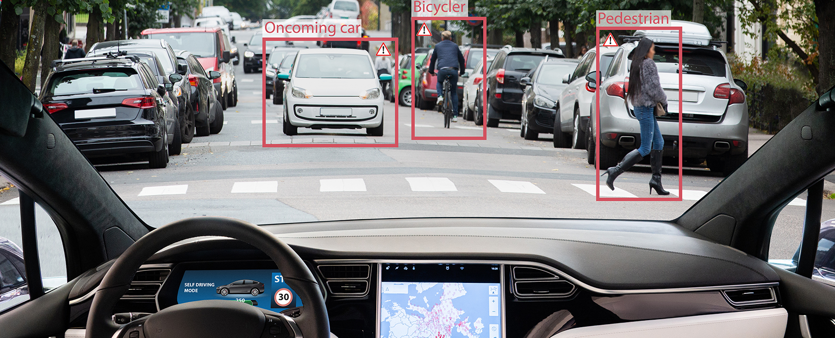 View from inside a car approaching a crosswalk; oncoming car, bicyclist, and pedestrian are marked with red boxes and labels—ideal for chicago lawyers or those needing litigation support in accident cases.