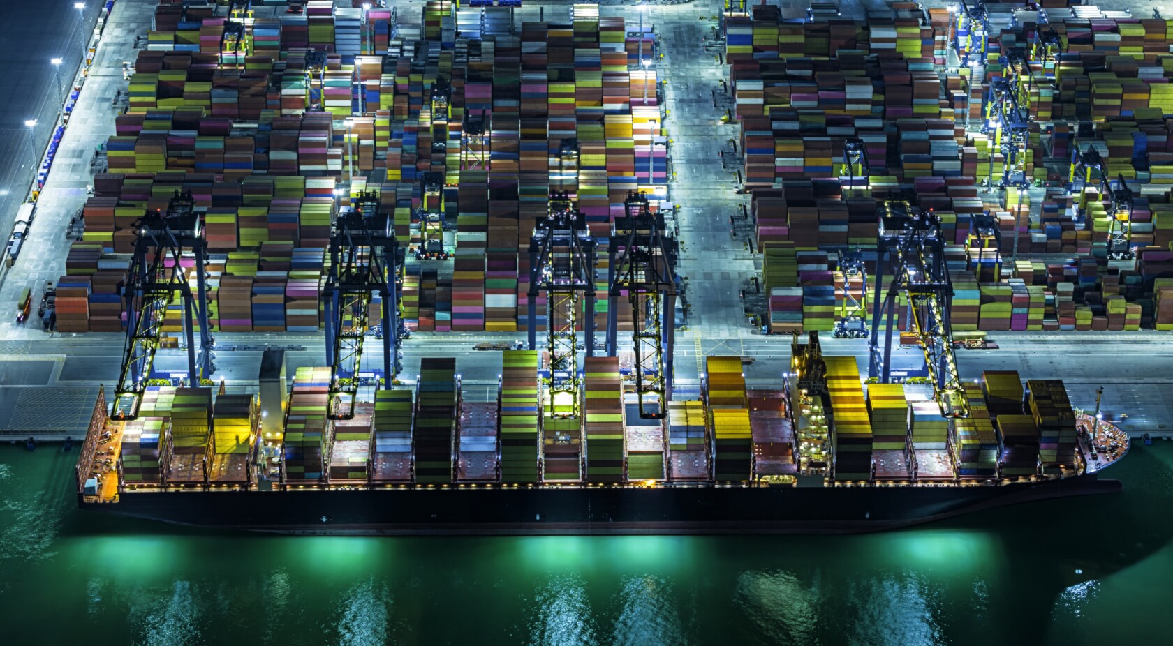 Aerial view container terminals at night.