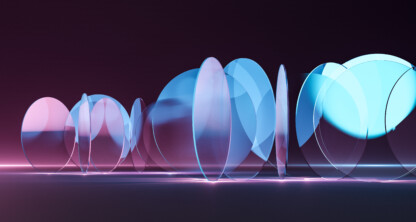 A series of transparent, overlapping glass-like discs stand upright on a reflective surface under blue and purple lighting.