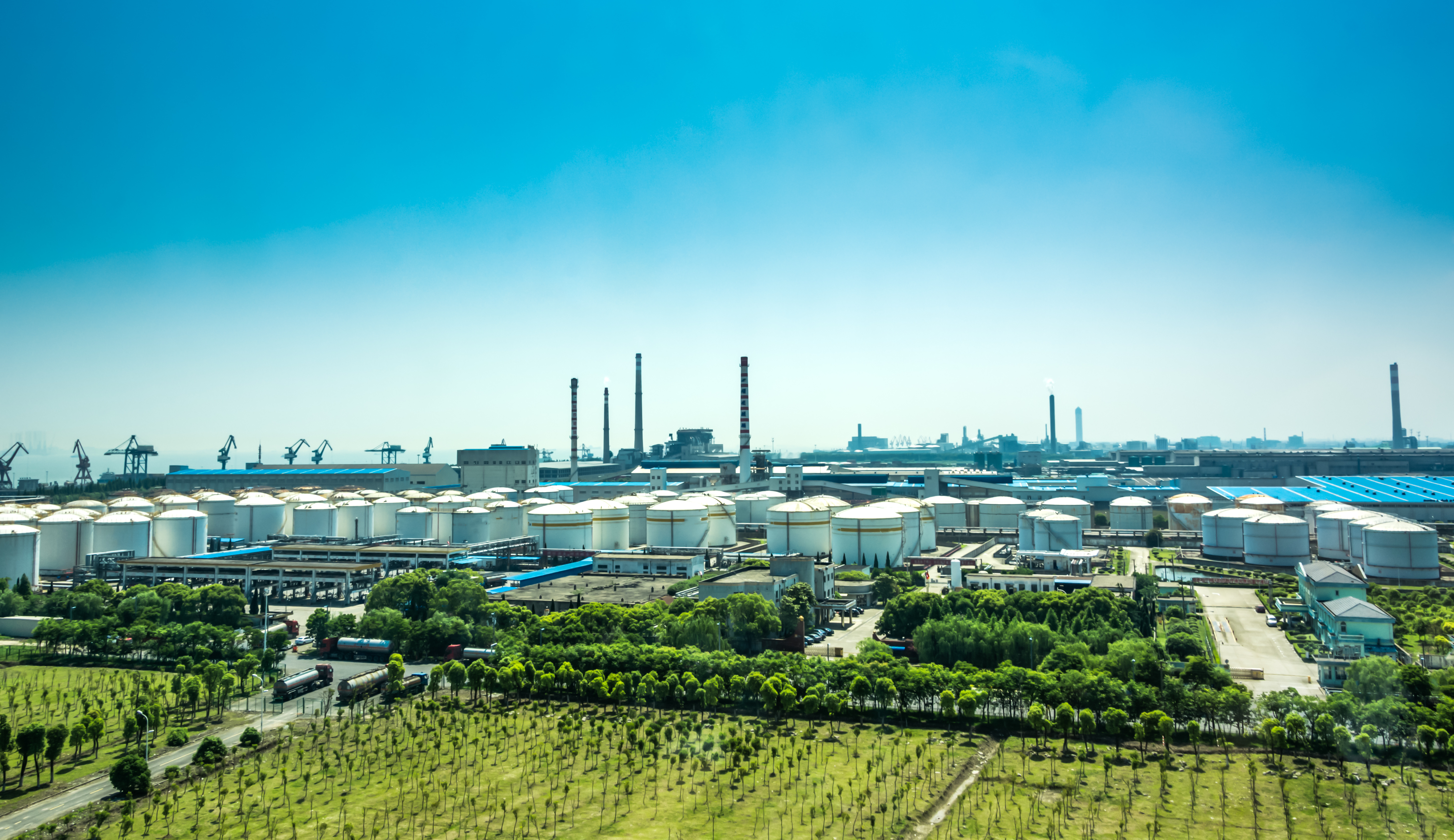 oil refinery plant against blue sky